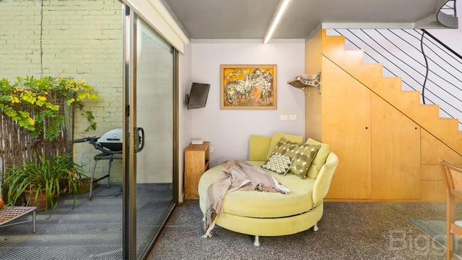 An Abbotsford townhouse with a ground-floor studio and mezzanine bedroom sold after passing in.