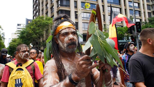 Protester at a rally about themes including a fight against injustice and remembrance of the Stolen Generations and Aboriginal sovereignty. Picture: Joshua Prieto