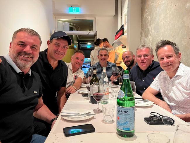 (L-R): Ange Postecoglou, Manny Anezakis, Ralph Battista, Nick Deligiannis, Leon Anezakis, Chris Nikou and John Patsoukas catching up for dinner when Postecoglou was in Sydney with Celtic in 2022. Manny Anezakis and Battista are also headed to Bilbao. Pic Supplied.