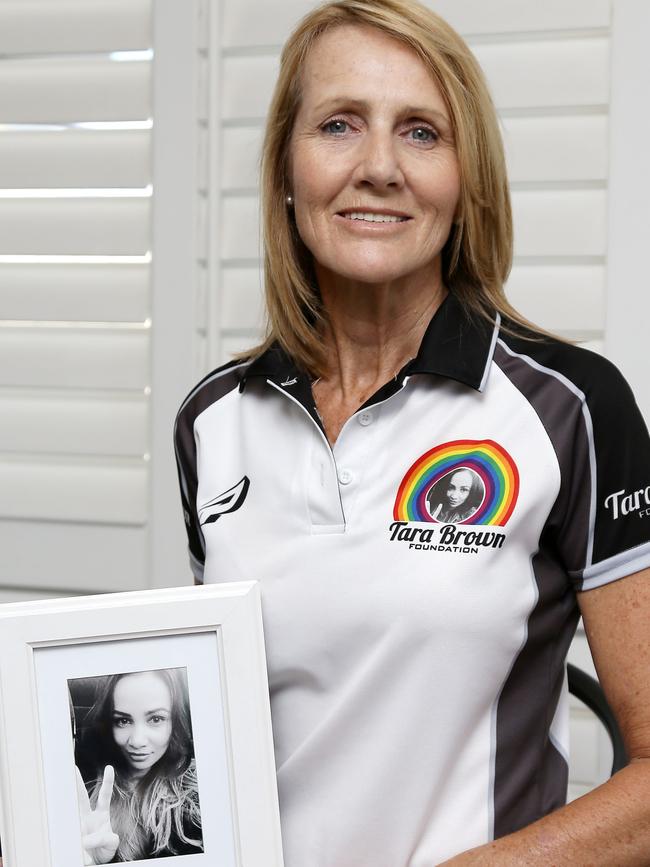 Natalie Hinton with a photograph of her daughter. Picture: Tertius Pickard