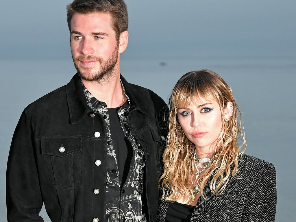 Liam Hemsworth and Miley Cyrus at the Saint Laurent Men’s Spring Summer 20 Show. Picture: Neilson Barnard/Getty Images