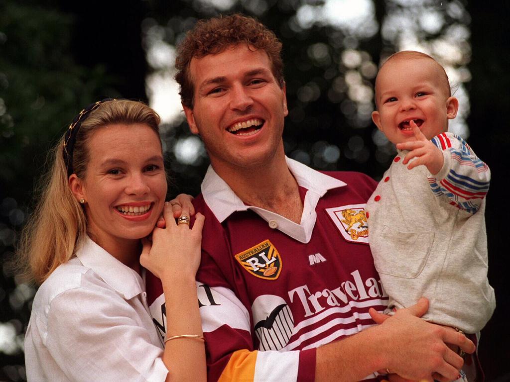 Sam Scott-Young, pictured with wife Donna and son Issac, had a crack at the Broncos.