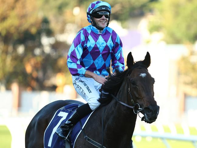 SYDNEY, AUSTRALIA - APRIL 13: Declan Bates riding Pride of Jenni wins Race 8 Queen Elizabeth Stakes during Sydney Racing: The Championships at Royal Randwick Racecourse on April 13, 2024 in Sydney, Australia. (Photo by Jeremy Ng/Getty Images)