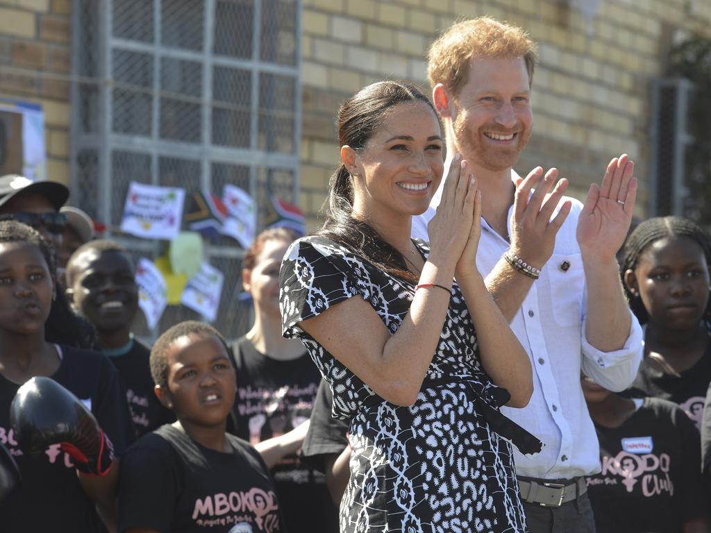 The couple received glowing coverage of their South Africa trip, but it was overshadowed by another bombshell statement from Prince Harry. Picture: Courtney Africa/Pool via AP.