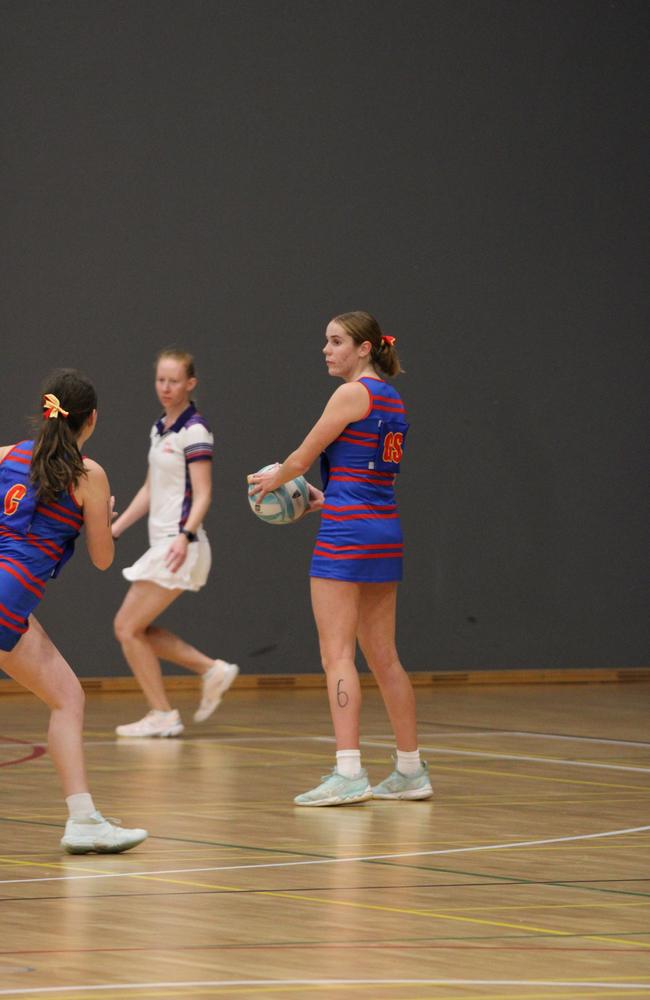 Netball action at QISSN 2024 held in Townsville. St Columbans College v Downlands College