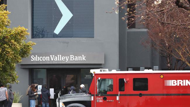 A Brinks armoured truck sits parked in front of the shuttered Silicon Valley Bank (SVB) headquarters. Picture: Getty Images via AFP.