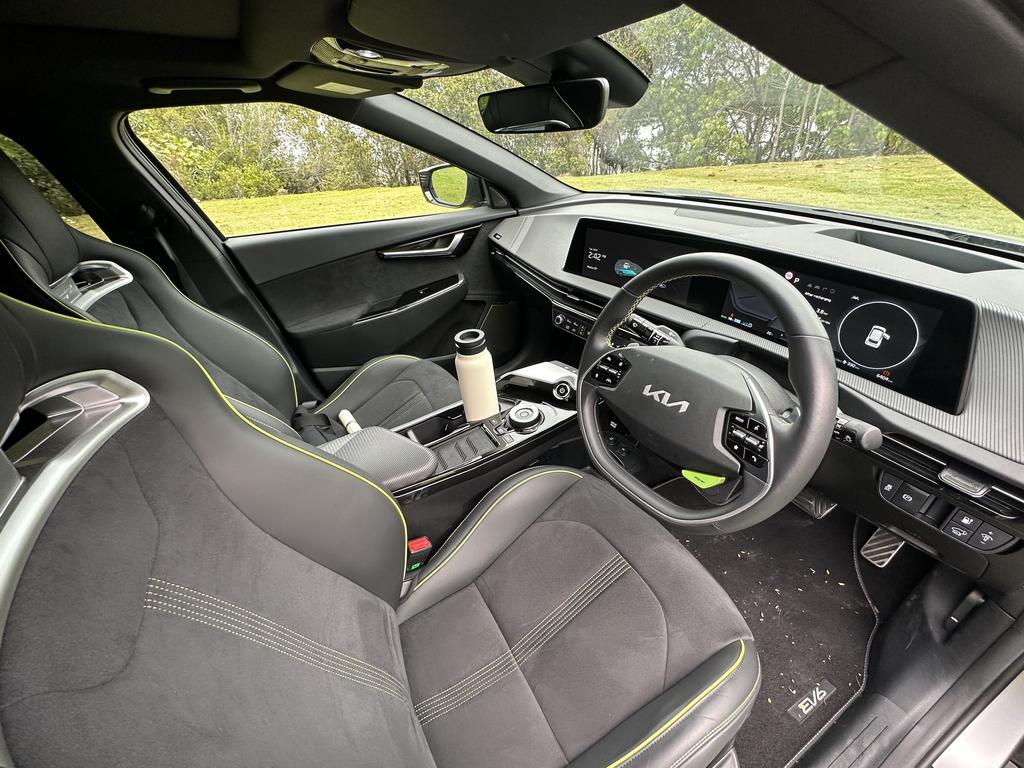 It has a sporty black interior with bright lime green accents. Picture: Elly Awesome