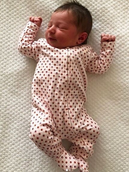 Crows defender Daniel Talia and wife Megan have welcomed their first child, Ivy Grace. Picture: Instagram.