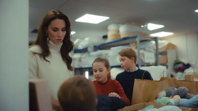 The Princess of Wales and her children do charity work on December 12. Picture: Kensington Palace/Youtube