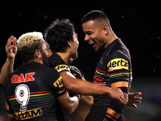 Penrith's Stephen Crichton celebrates his try with Jarome Luai during NRL match between the Penrith Panthers and Canberra Raiders at Penrith Stadium. Picture. Phil Hillyard