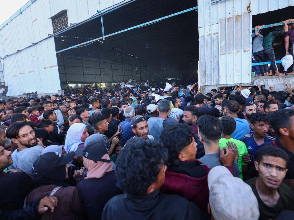 Four people were killed in the chaos at the food warehouse. Picture: AFP