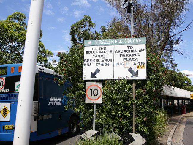 Bus signs in Strathfield Square are hopelessly out of date, confusing commuters. Picture: Craig Wilson