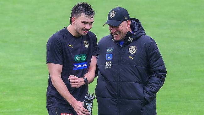 Richmond coach Adem Yze shares a laugh with Josh Gibcus, who has been battling hamstring issues. Picture: Ian Currie