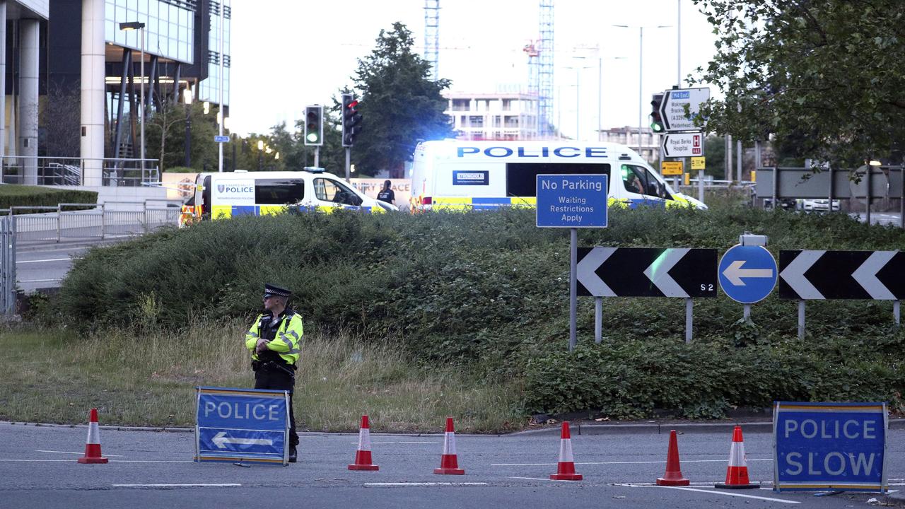 Police investigate near Forbury Gardens in the town centre of Reading, England, where they are responding to a "serious incident" Saturday, June 20, 2020. (Steve Parsons/PA via AP)