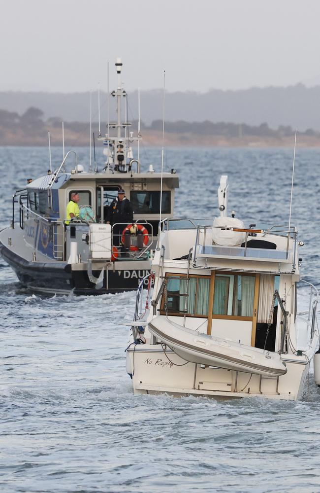 Tasmania Police vessel Dauntless towing the boat No Replay. Picture: Nikki Davis-Jones