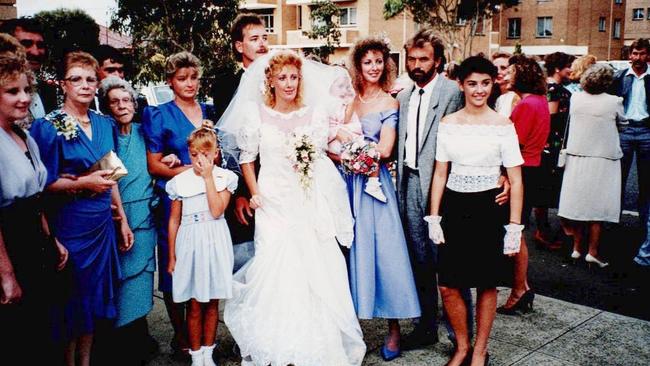 Missing mother Bronwyn Winfield at her brother Andy’s wedding to Michelle. Bronwyn is to the right of the bride; her mother Barbara is second from the left.