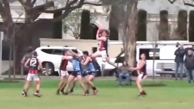 Jett Boxer takes a mark of the year contender against Glenunga. Picture: Adelaide Footy League, Filming Footy