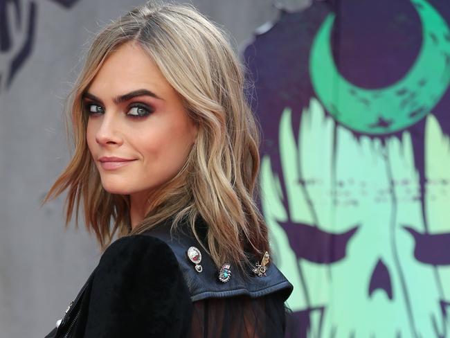 Cara Delevingne said she was relieved to see a female assistant in the room, only to have to avoid her sexual advances in front of Harvey Weinstein. Picture: AFP PHOTO / JUSTIN TALLIS
