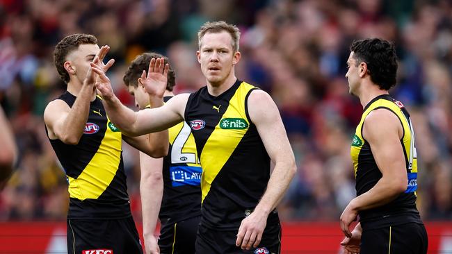 MELBOURNE, AUSTRALIA – JULY 30: Jack Riewoldt of the Tigers celebrates a goal with teammates during the 2023 AFL Round 20 match between the Richmond Tigers and the Melbourne Demons at Melbourne Cricket Ground on July 30, 2023 in Melbourne, Australia. (Photo by Dylan Burns/AFL Photos via Getty Images)