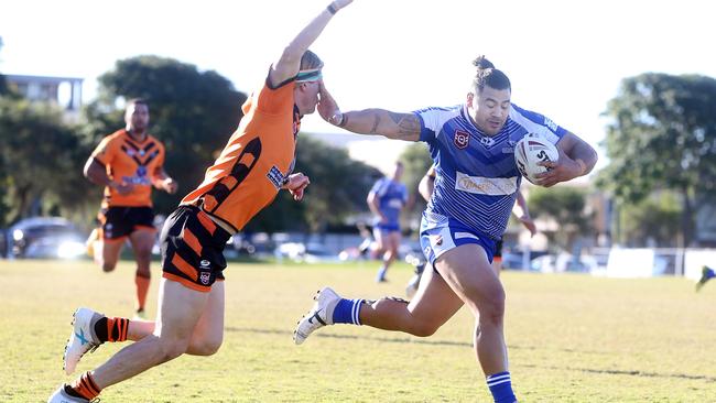 Samui Latu scores a try for Tugun against Southport. Picture by Richard Gosling