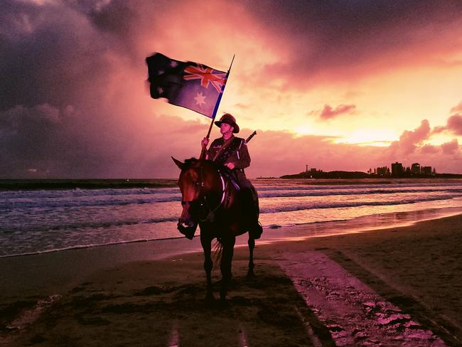 The Sunshine Coast will mark Anzac Day on Tuesday with a range of services throughout the region. Lone horseman Rusty and horse Jack are pictured at a previous Mooloolaba dawn service.