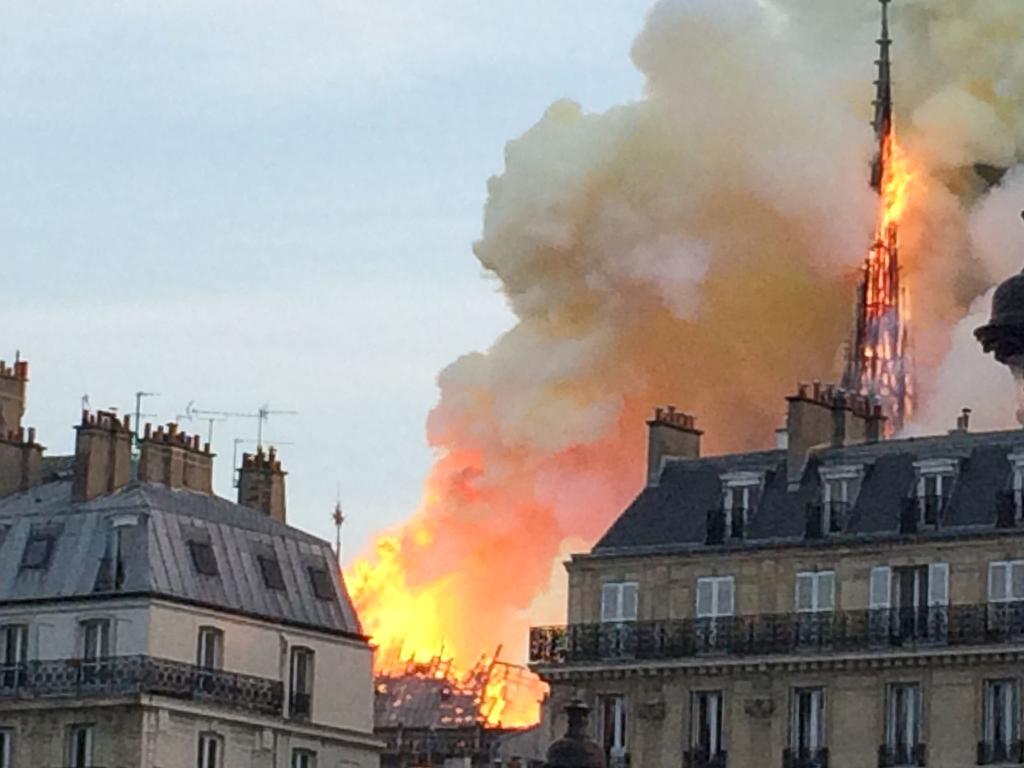 Smoke and flames rising during a fire at the landmark Notre-Dame Cathedral in central Paris. Picture: AFP
