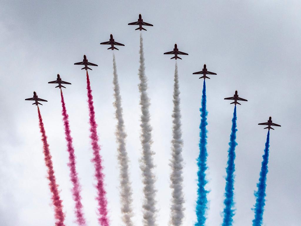 The British Royal Air Force's aerobatic team, the "Red Arrows" fly-past central London. Picture: AFP