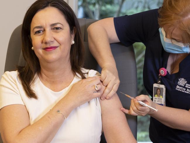 BRISBANE AUSTRALIA - NewsWire Photos JUNE 7, 2021: Queensland Premier Annastacia Palaszczuk is given the her COVID-19 vaccination by clinical nurse Dawn Pedder at the Surgical Treatment Rehabilitation Service Centre in Brisbane. NCA NewsWire / Sarah Marshall