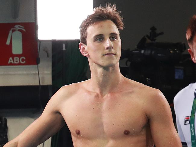 A stunned Cameron McEvoy who finished 7th in the Men's 100m freestyle Final waits his turn while Gold medalist Kyle Chalmers talks to the media on day five of the swimming at the Rio 2016 Olympic Games. Picture. Phil Hillyard
