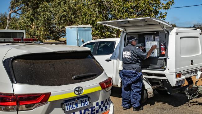 Forensics are pictured at the home where Terence Kelly lived on Saturday. Picture: Kelsey Reid/The West Australian