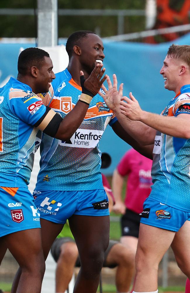 Pride's Dantoray Lui, Marly Bitungane and Will Partridge celebrate a try in the Hostplus Cup Queensland Rugby League (QRL) match between the Northern Pride and the Sunshine Coast Falcons, held at Barlow Park, Cairns Picture: Brendan Radke