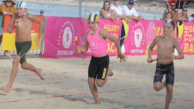 Running action at the Queensland Youth Surf Life Saving Championships on February 17.