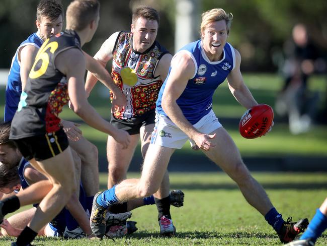 03/06/17 - Division 1 football - Goodwood versus St Peter's Old Collegians.SPOC'S T. Fotheringham gets away with the ball. Picture Dean Martin