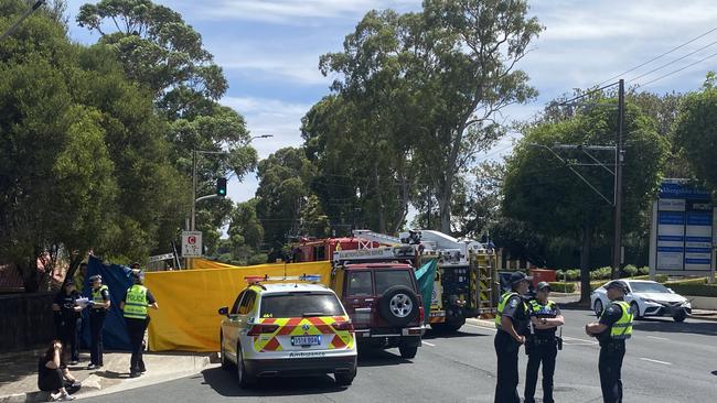 Police and emergency services at the scene of the crash on Portrush Rd. Picture: Todd Lewis