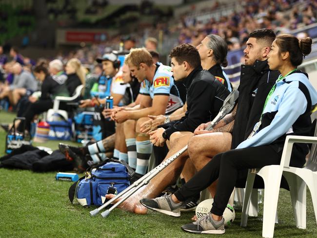 Braden Hamlin-Uele of the Sharks watches the game from the bench after injuring his ankle. Picture: Robert Cianflone/Getty Images