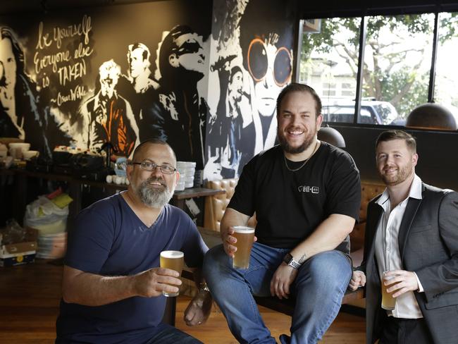 DA’Burger owner James D’Ath, general manager Matija Stefancic and agent Ben Hackett pictured at the chain’s former West End outlet. Picture: AAP/Megan Slade