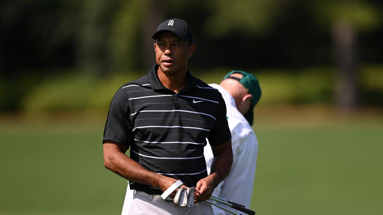 Woods looks on from the practice area prior to the 2023 Masters at Augusta National Golf Club. Picture: Getty Images