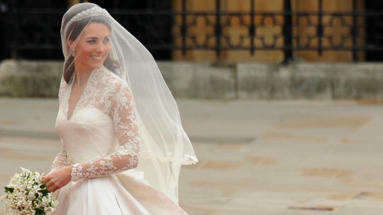 Kate Middleton smiles as she arrives at Westminster Abbey for her wedding to Prince William on April 29, 2011. Picture: Ben Stansall/AFP/Getty Images.