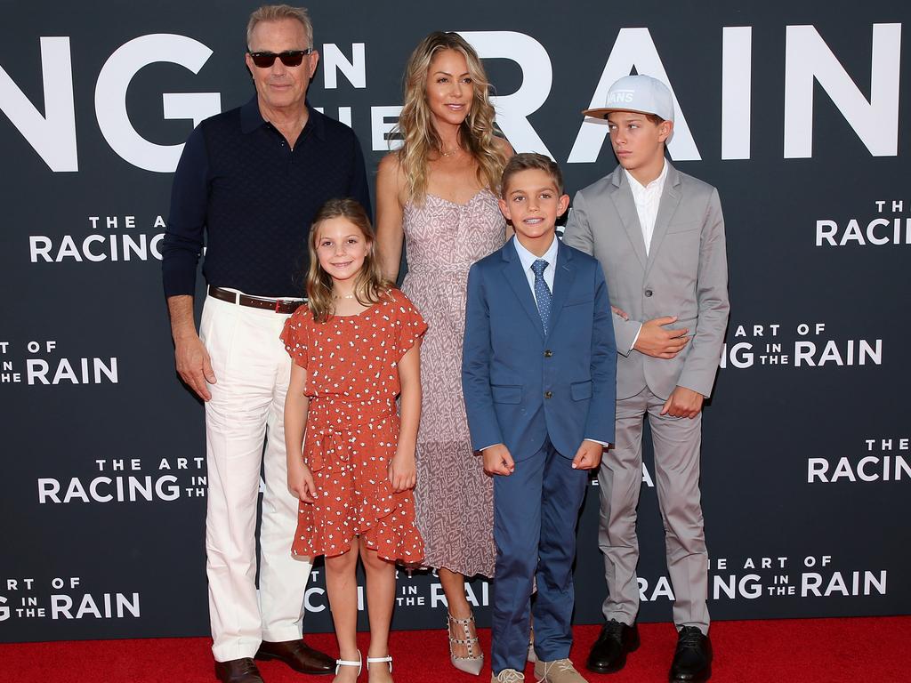 The couple with their three children. Picture: Phillip Faraone/Getty Images