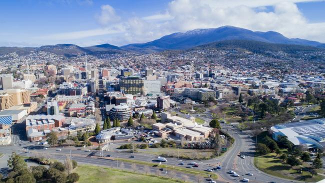 Hobart aerial showing new Remembrance Bridge, ABC ( Railway ) roundabout and the CBD. Mt Wellington with snow. Menzies / Macquarie Street / File / Generic / Drone