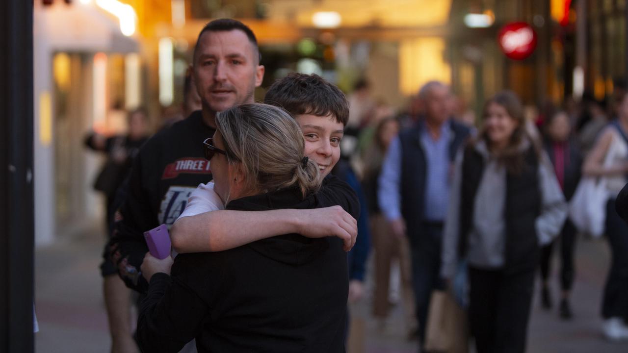 Relieved shoppers after the ordeal. Picture: Brett Hartwig