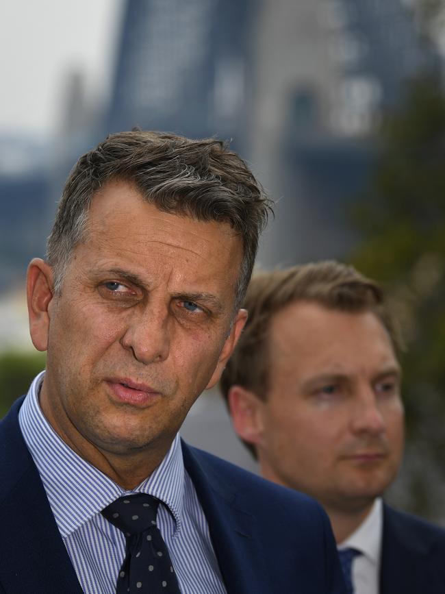 NSW Minister for Roads Andrew Constance and Manly MP James Griffin (right) address the media at Observatory Hill . Picture: Dean Lewins