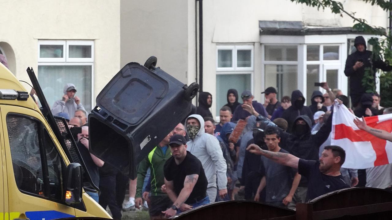 Bins and other objects were hurled at police. Picture: Getty Images