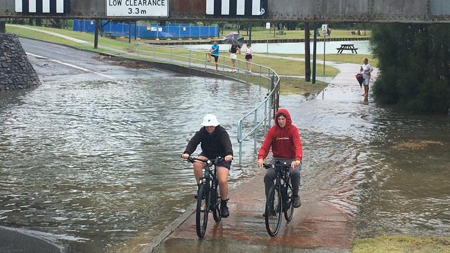 Two boys on bikes had no trouble getting across the walkway on Ocean Parade on Tuesday. Photo: Chris Knight.