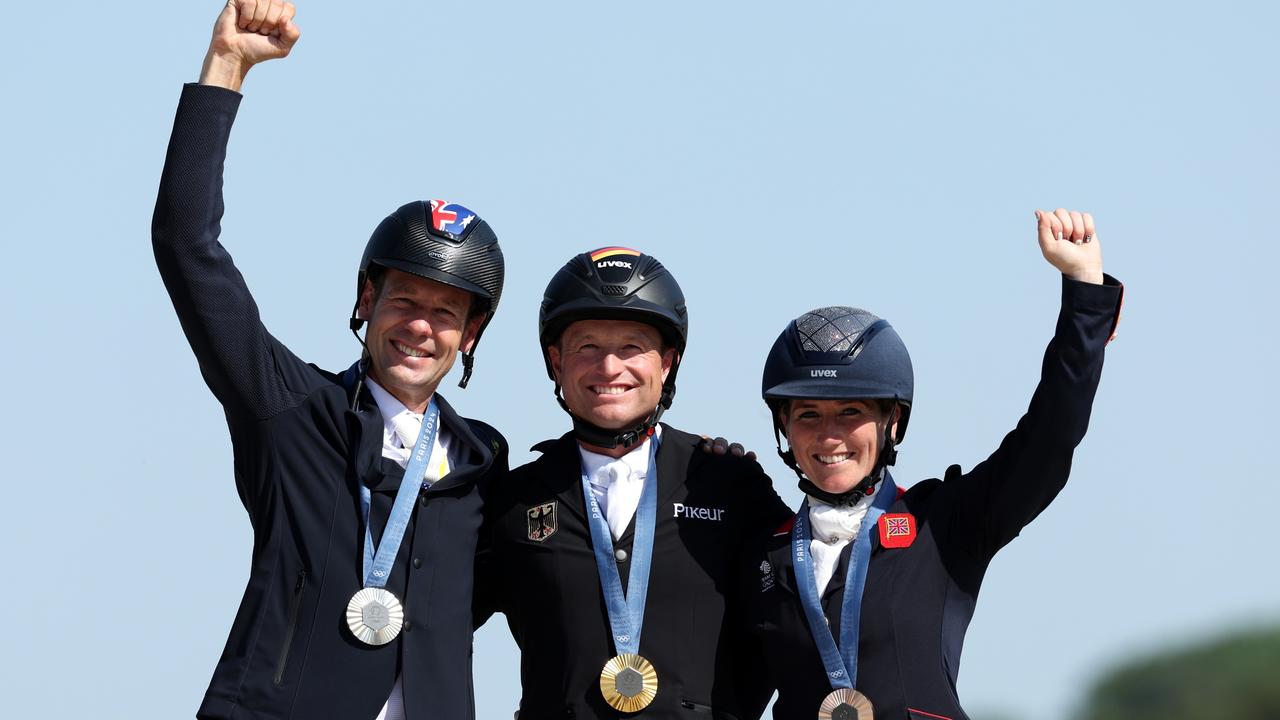 Gold medallist Michael Jung of Team Germany with Chris Burton of Team Australia and bronze medallist Laura Collett. Picture: Kevin C. Cox/Getty Images