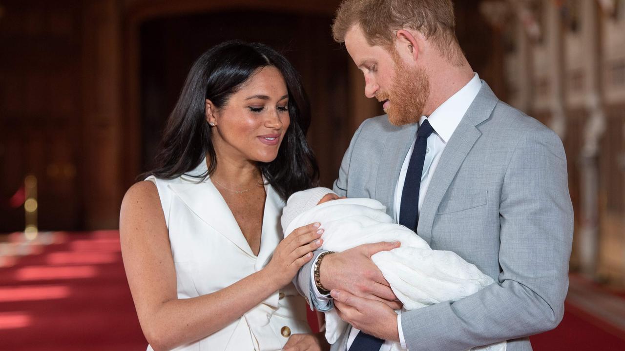 Harry, Duke of Sussex and his wife Meghan, Duchess of Sussex, pose for a photo with their newborn baby son, Archie Harrison Mountbatten-Windsor, in May 2019. Picture: Dominic Lipinski/AFP