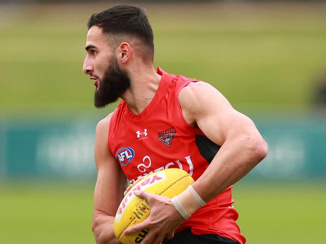 Saad El-Hawli was right behind Andy McGrath as the Dons were put through their paces. Picture: Kelly Defina/Getty Images