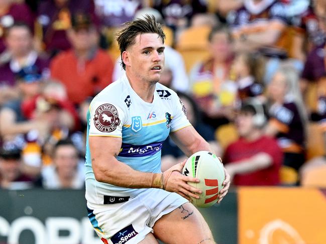 BRISBANE, AUSTRALIA - JUNE 25: AJ Brimson of the Titans in action during the round 17 NRL match between Brisbane Broncos and Gold Coast Titans at Suncorp Stadium on June 25, 2023 in Brisbane, Australia. (Photo by Bradley Kanaris/Getty Images)