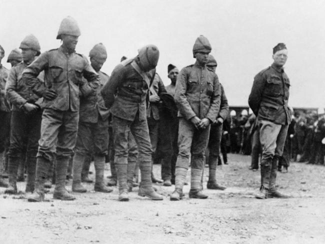 Winston Churchill (right) with a group of other prisoners in 1899.