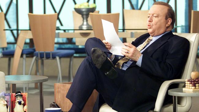 Television giant ... Bert Newton relaxing on the set of his long-running show <i>Good Morning Australia</i>.